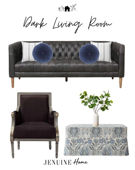 Dark living room. Moody living room. Blue circle throw pillow. Grey striped throw pillow. Midnight living room. Pattern ottoman. Blue foot rest. Black velvet chair. Black leather couch. Faux plant decor  

#LTKSeasonal #LTKstyletip #LTKhome