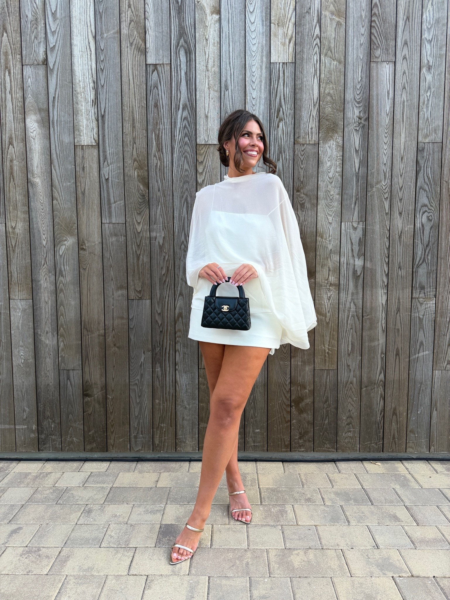 Love this outfit!! Wearing a size Large in the Cape/tank (sold as a set) & a size 12 in the skort!!