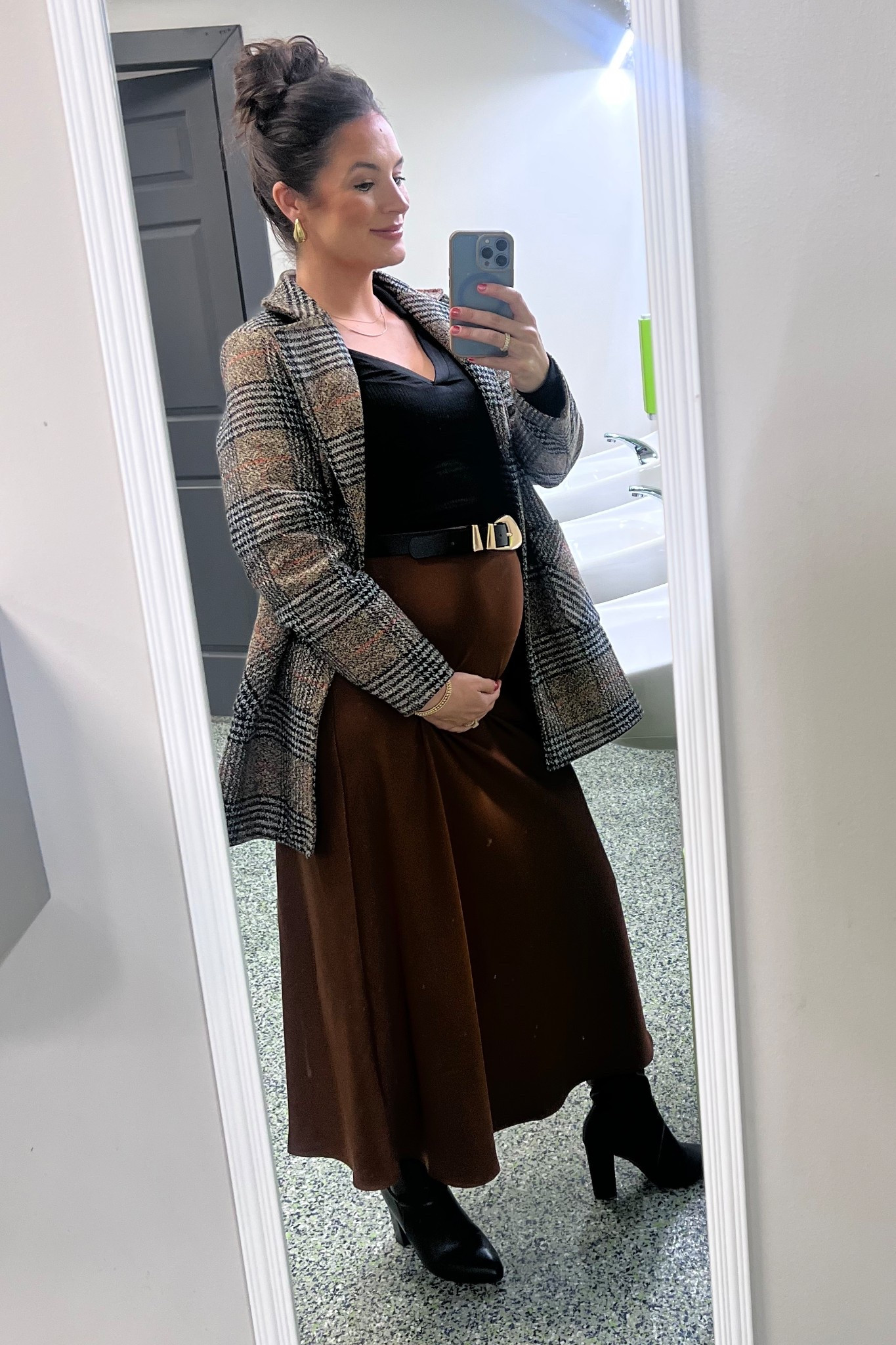 Bumping into month 7 this holiday season! Obsessed with this skirt and its hidden elastic waist! Person for your growing body.

#LTKootd #LTKHoliday #LTKBump