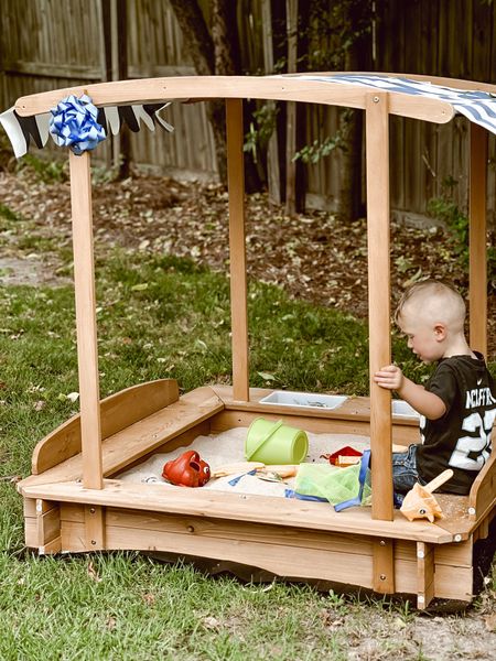 Cozy little sandbox! We hid little dinosaurs in the sand for him to find too. It comes with a tarp to close the sandbox to keep little critters out. And I love the little canopy for shade— hours of fun! 

#LTKkids #LTKGiftGuide #LTKhome