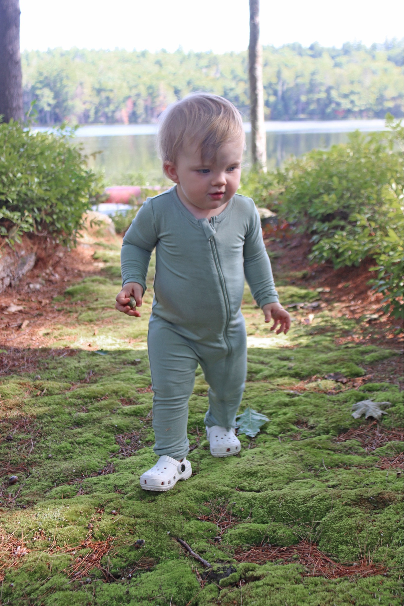 Lily is almost one and a half and CONSTANTLY on the move.  She’s wearing  @kytebaby zipper footie and having the best time at the lake.  #Kytebaby, #KytePartner #ad 

#LTKFindsUnder50 #LTKBaby #LTKKids