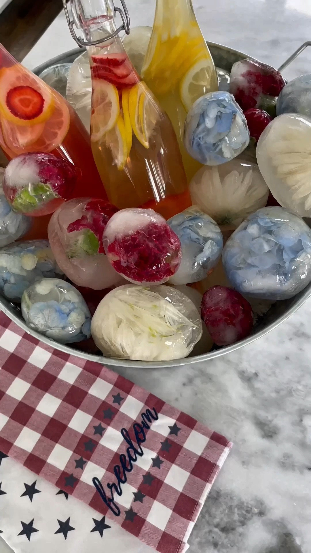 These Red, White, & Blue Flower Ice Balls are made with water and red, white, and blue flowers. They are perfect for keeping your drinks chilled at your next 4th of July party.

See tutorial:
https://domesticallyblissful.com/red-white-blue-flower-ice-balls/

🔗 Join our newsletter: https://domesticallyblissful.com/newsletter/ 

#LTKSeasonal #LTKOver40 #LTKParties