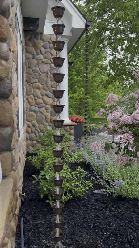 Rain chains are the perfect solution for the place you don’t want a down spot to come down and wash away mulch or the ugly look of the metal spewing out water! Make sure to get the adapter too! 

#LTKhome #LTKstyletip #LTKfindsunder100