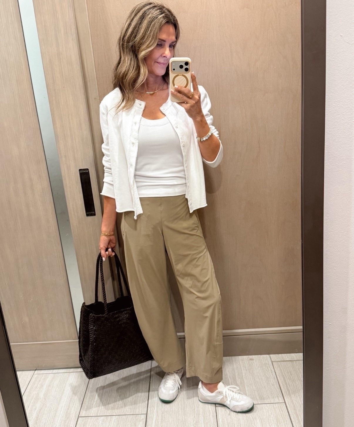 Travel look for summer travel 
Wearing a 2 in Ruti Pant. 

A favorite tank, double lined, bra friendly. Sz S https://go.shopmy.us/p-47255006
-woven bag great for travel! 
-Jersey cardi sz Small 
-Sneakers TTS size up if in between 

#LTKootd #LTKOver40