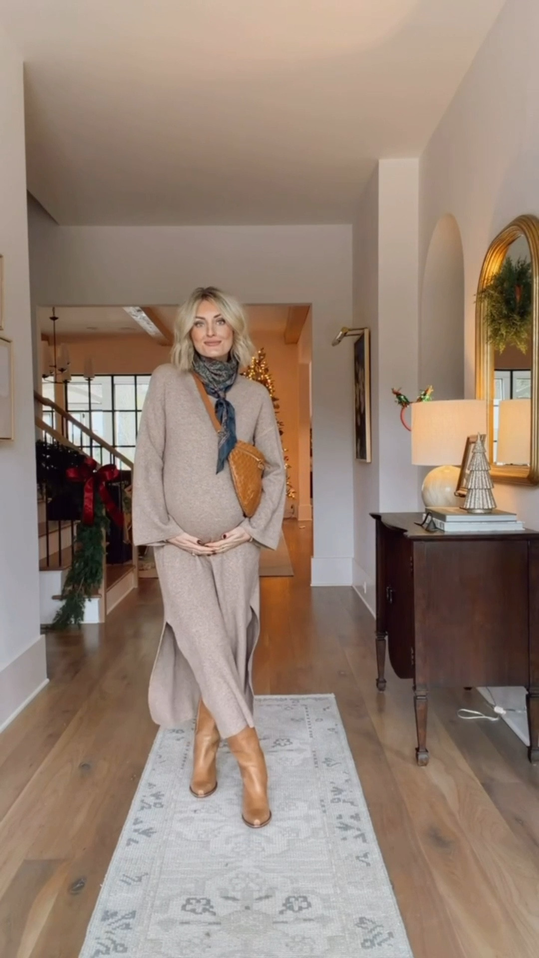 I’m living in sweater dresses this far along in my pregnancy! They’re so comfortable, but still really cute! This neutral maxi sweater dress is one I got last year, and have worn several times! It’s a winter staple! Wearing XS in the dress!

Loverly Grey, sweater dresses, maternity, silk scarf, belt bag, coat, winter outfit, winter staples 

#LTKSeasonal #LTKBump