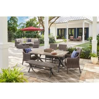 Rock Cliff 6-Piece Brown Wicker Outdoor Patio Dining Set with Bench and CushionGuard Riverbed Tan... | The Home Depot