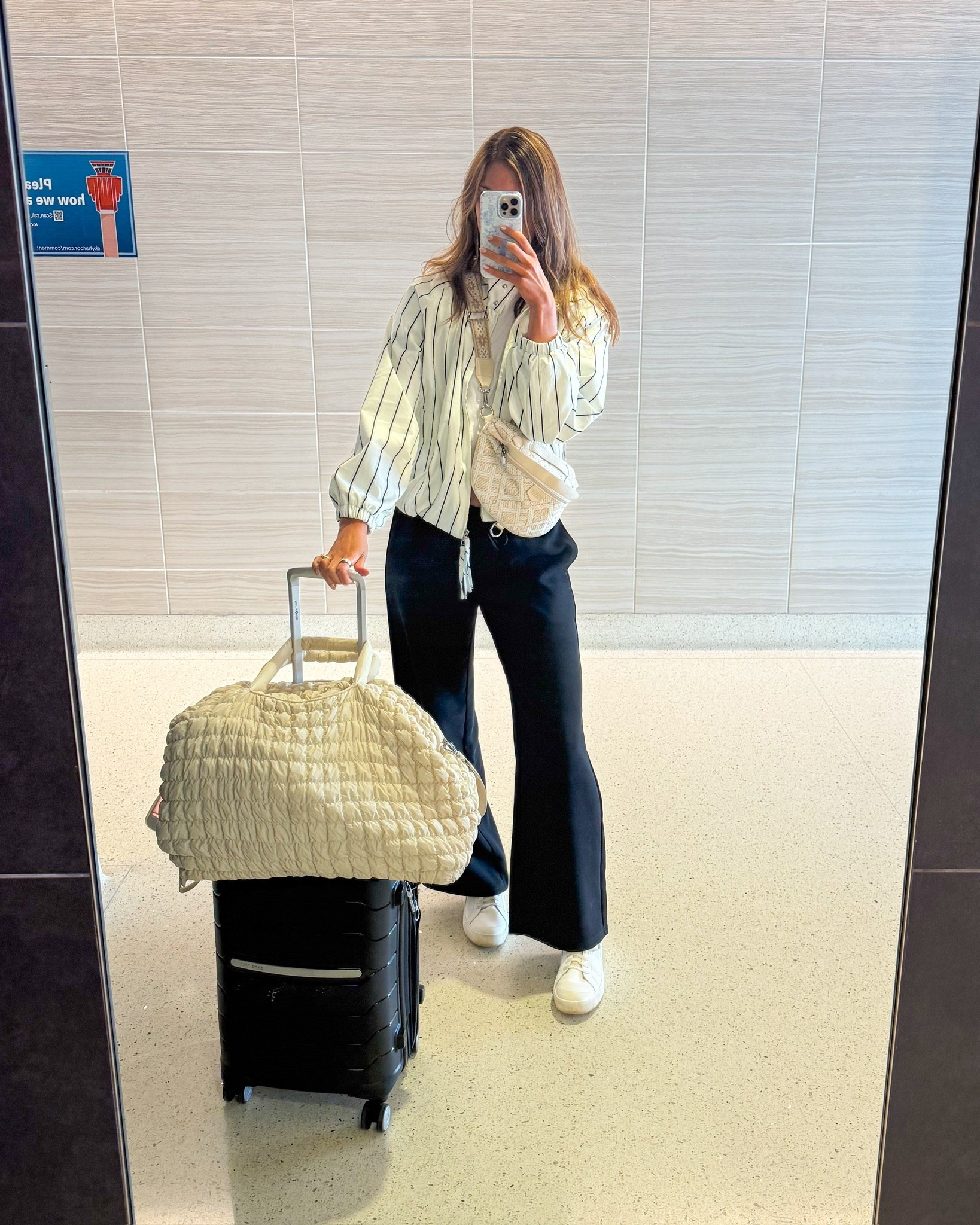 A travel outfit that gets the comfort part right without looking like you’re headed straight to the couch. The black pants keep it classic, while the striped jacket adds just enough interest.

travel outfit, airport outfit, striped jacket, black pants, comfortable travel outfit, travel style, casual outfit, fall travel outfit, tall girl style, everyday outfit, StangandCo

#LTKootd #LTKTravel #LTKTall