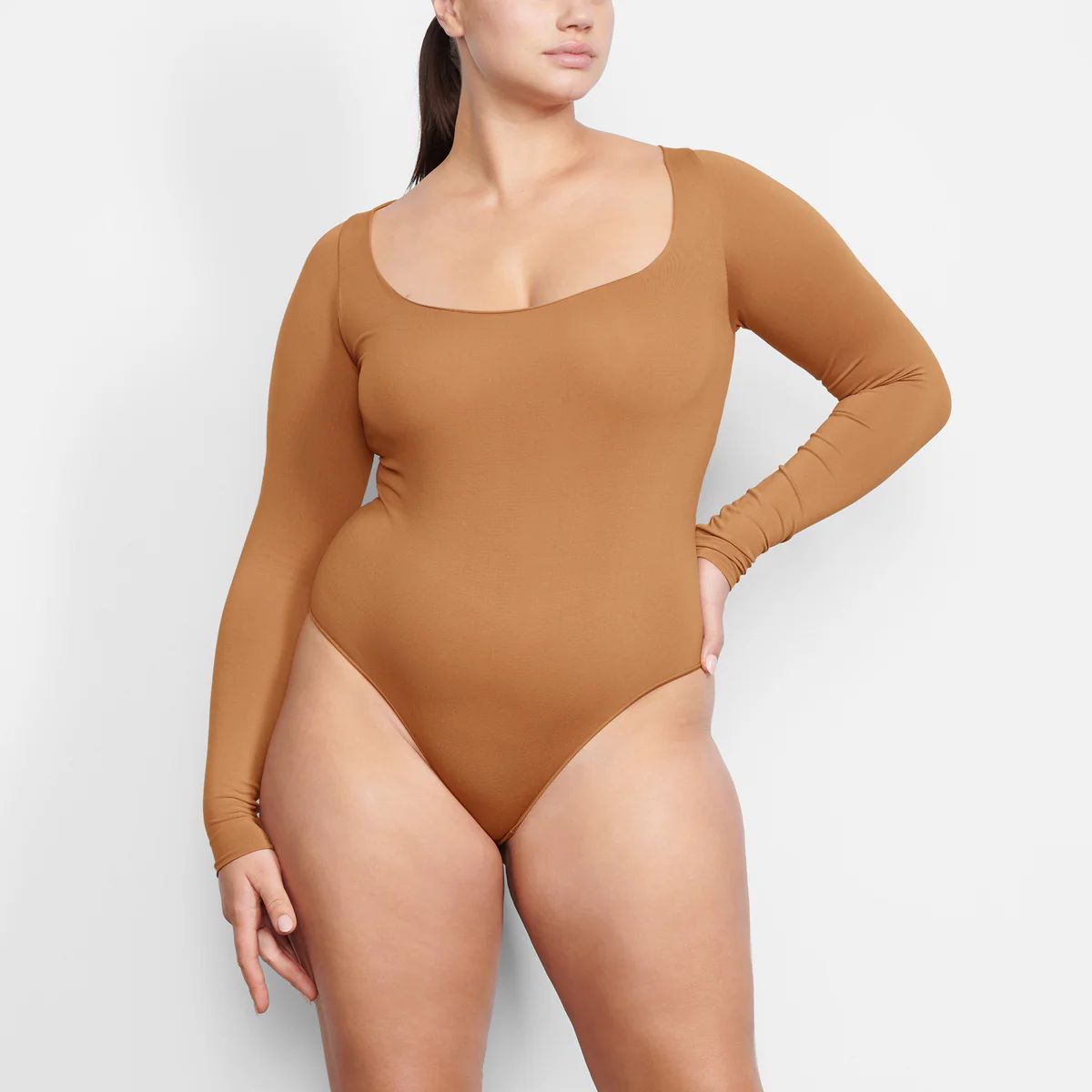 ESSENTIAL LONG SLEEVE SCOOP NECK BODYSUIT | SKIMS (US)