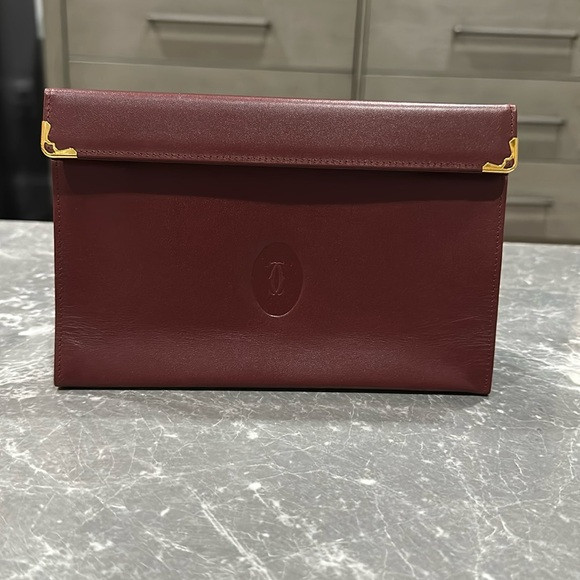Cartier Burgundy Leather Clutch with Gold Accents | Poshmark