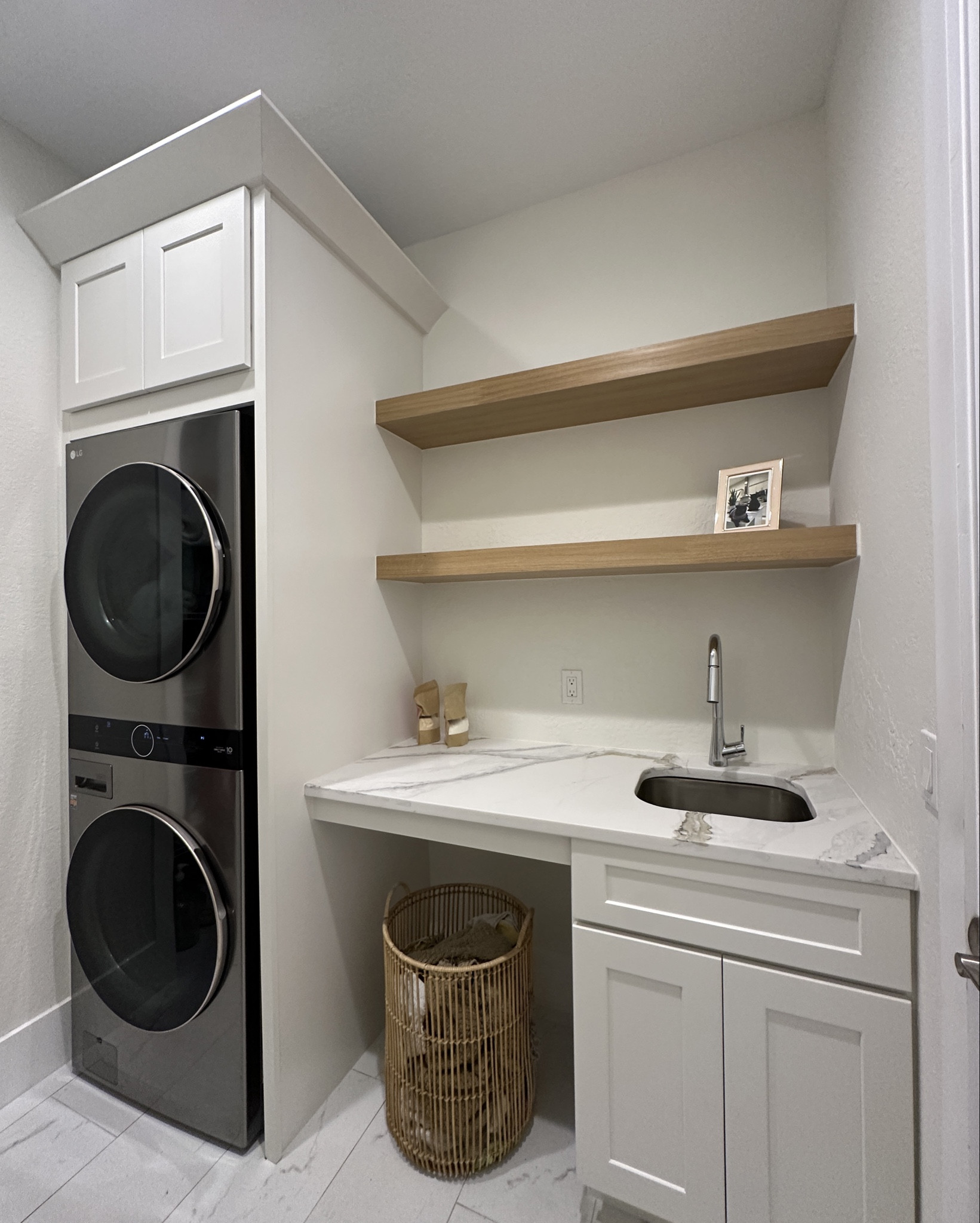 Little project 🛠️ laundry room remodel! 🫧 swipe for before!

#LTKHome