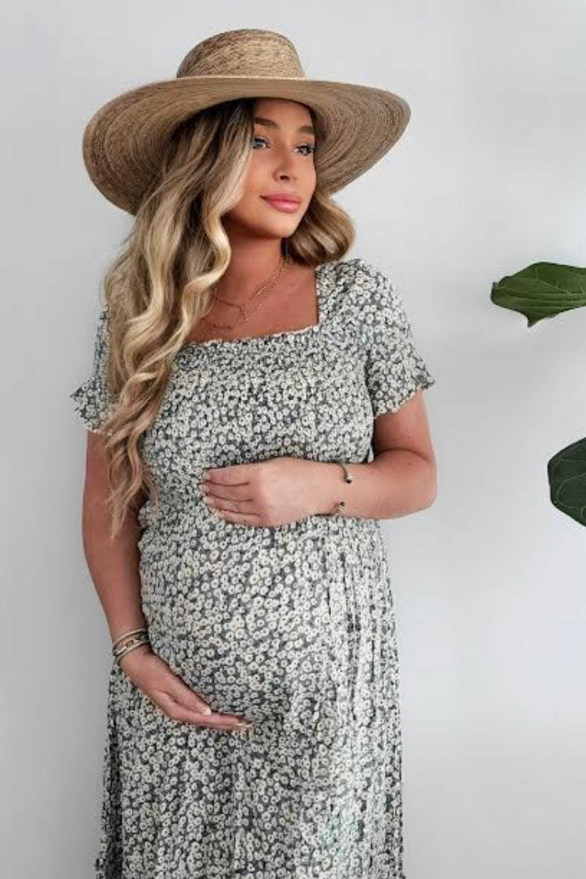 This floral maternity dress is perfect for spring and summer maternity outfits! Pair with a cute hat and sandals.

#LTKbump #LTKunder100