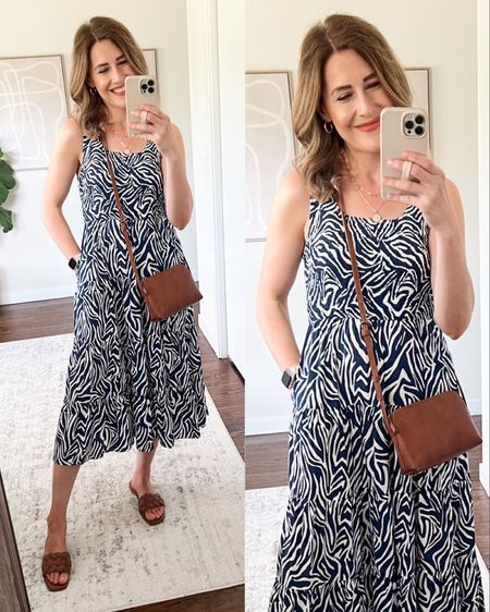 Amazon dress I am loving! Smooth and lightweight rayon, smocked top, tiered skirt. Fits tts small. Perfect for summer and vacation! #amazonfashion #amazonfinds spring dresses

#LTKstyletip #LTKunder100 #LTKunder50