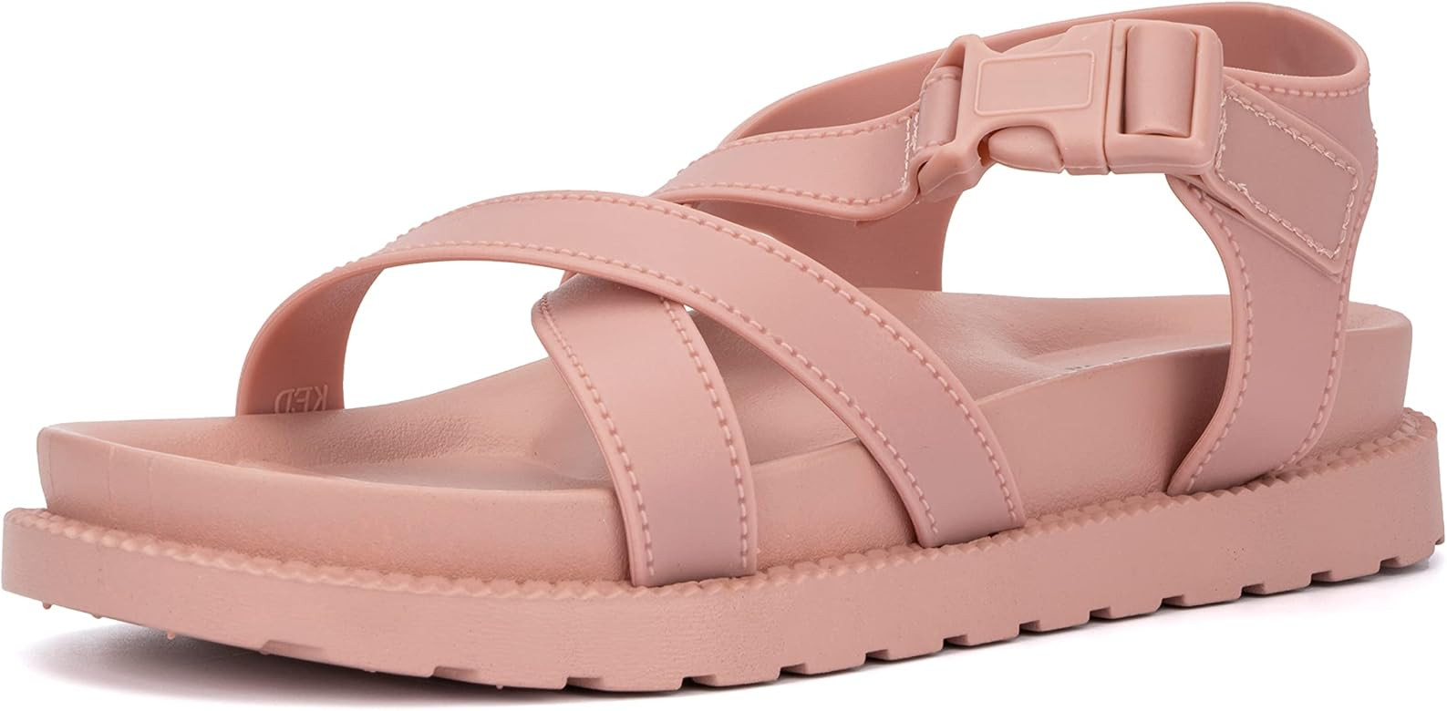 Olivia Miller Women's Fashion Ladies Shoes, PVC w Criss Cross Asymmetrical Strap n Buckle, Slip O... | Amazon (US)