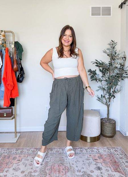 Comfy wide leg pants with stretchy waistband // sized up to XL / bump friendly / casual white slide on sandals for summer

#LTKmidsize #LTKstyletip #LTKfindsunder50