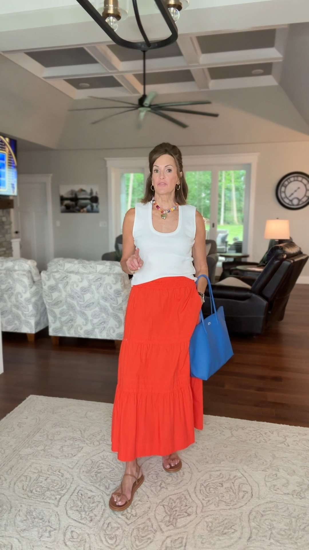 Scoop tank - large
Orange midi skirt - small (I don’t think the orange color is available but other colors are 

Vacation 
Summer style 
Travel 
European vacation

#LTKTravel #LTKWorkwear #LTKMidsize