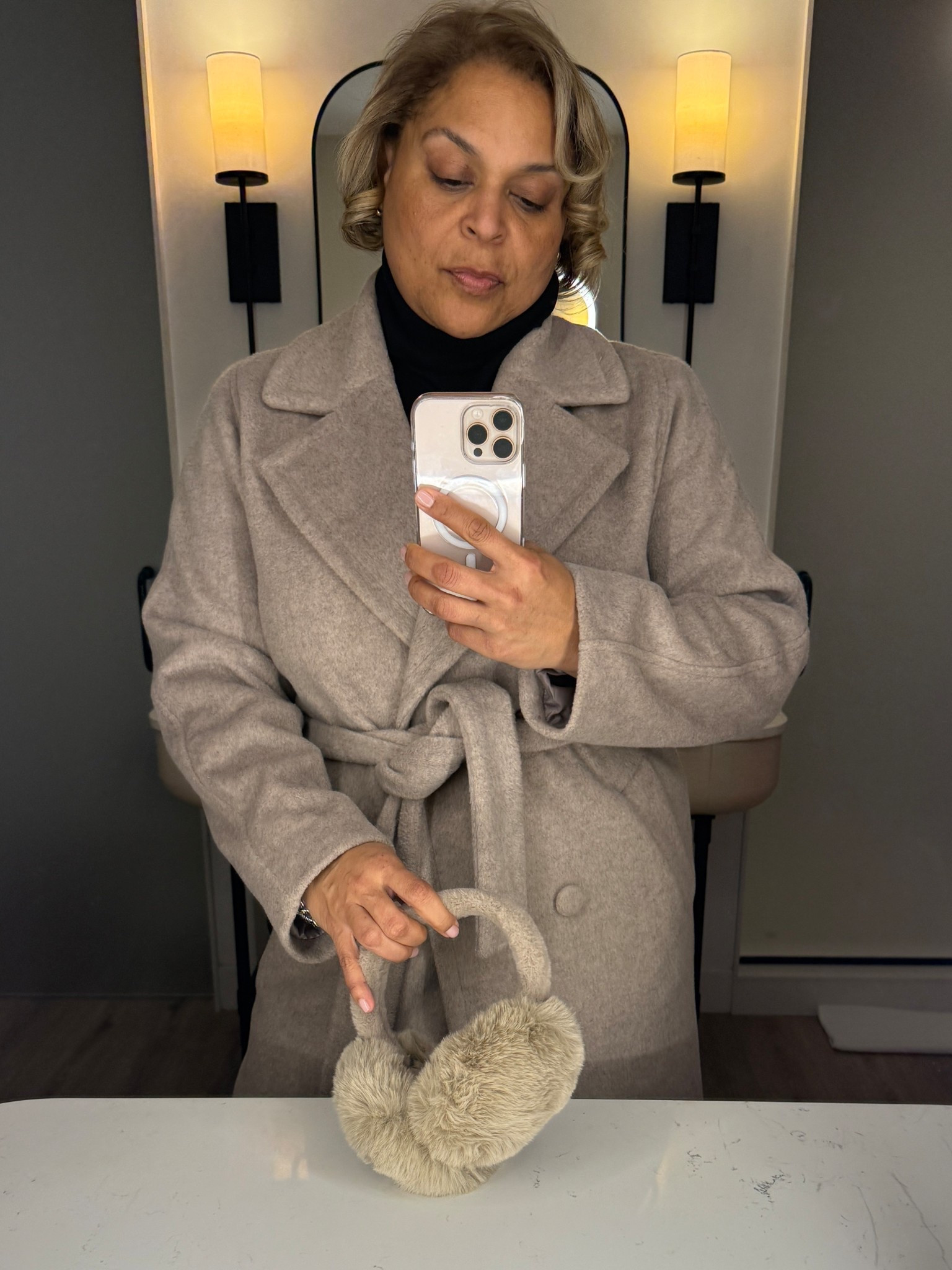 A good coat and fun earmuffs are a must have combo this season
Camel coat overcoat belted coat winter coat oatmeal coat fur earmuffs 

#LTKStyleTip #LTKFindsUnder100 #LTKSeasonal