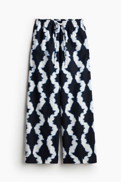 Wide linen-blend trousers - Navy blue/Patterned - Ladies | H&M GB | H&M (UK, MY, IN, SG, PH, TW, HK)