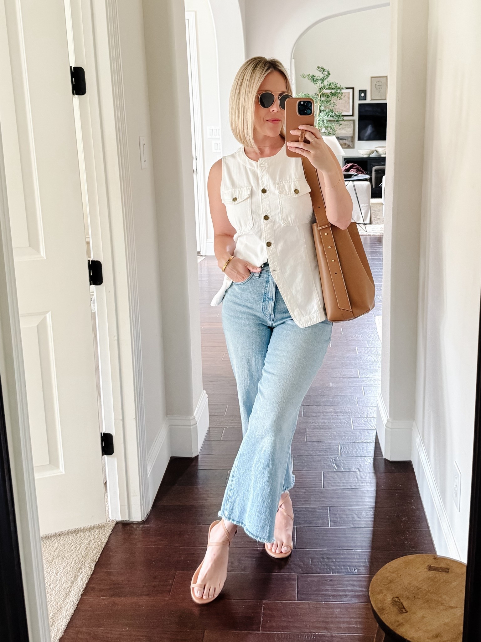 Summer outfit inspo with white denim vest, wide leg jeans, nude flat sandals, and tan leather tote

Use code SHELLEY25 for 25% off my bag

#LTKMidsize #LTKOver40