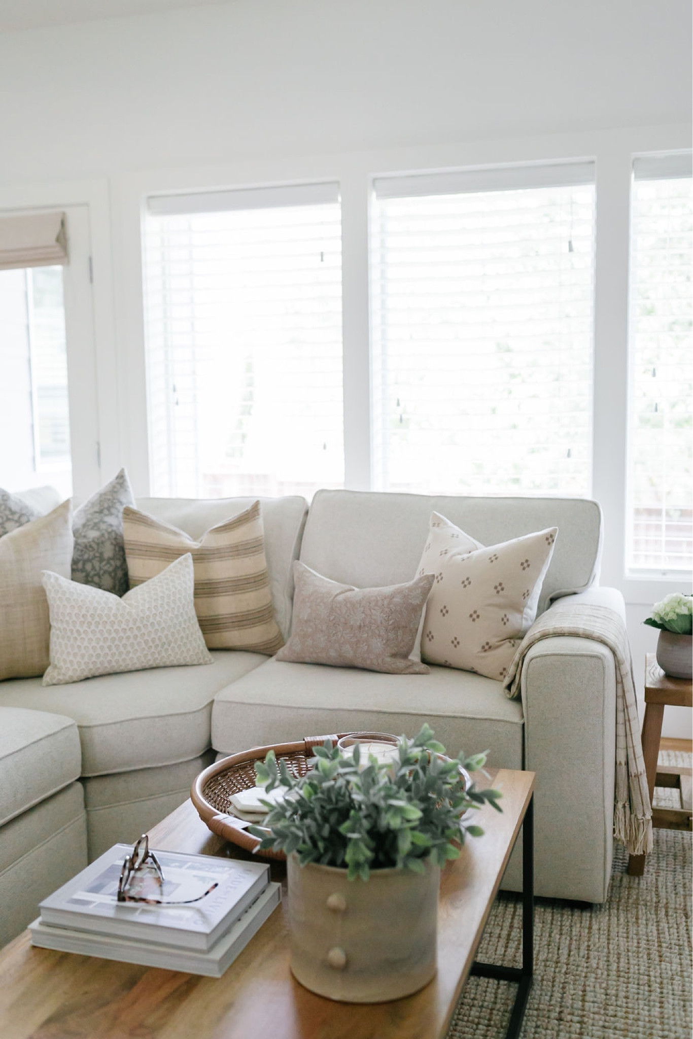 Love the pillows against the neutral sectional!!

Spring decor, living room decor, coffee table decor, Home decor, Pottery Barn Pearce sectional, wood side table, Pottery Barn wool jute rug, coffee table basket, throw pillows, throw blankets, wood coffee table, coffee table decor

#LTKstyletip #LTKSeasonal #LTKhome