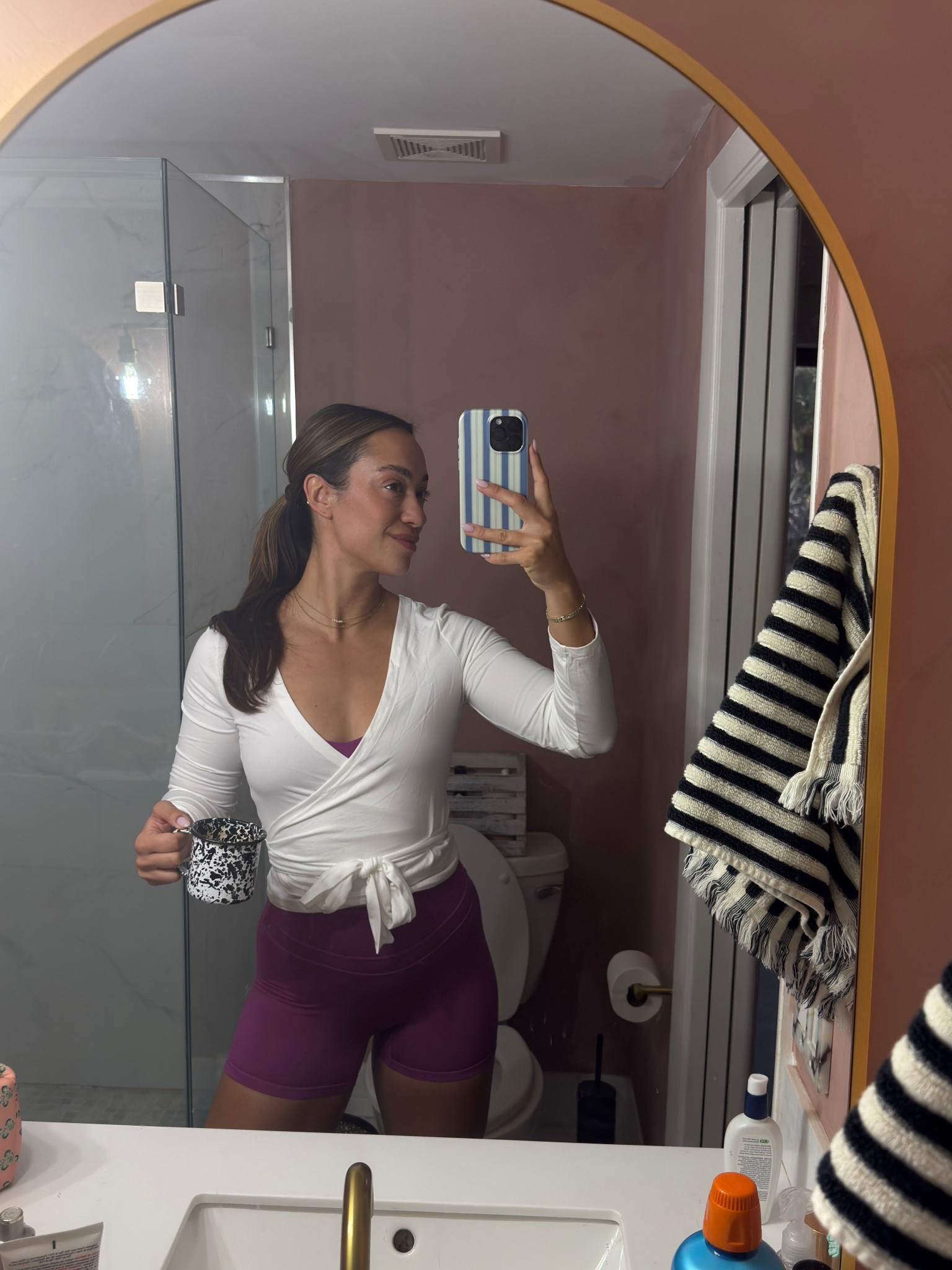 Trying a new gym today which calls for a new workout set! Wearing my ptula active mvp shorts + vital bra in the color dahlia. Loving this little Pilates wrap top for chilly mornings!! 

#LTKStyleTip #LTKFindsUnder50 #LTKActive