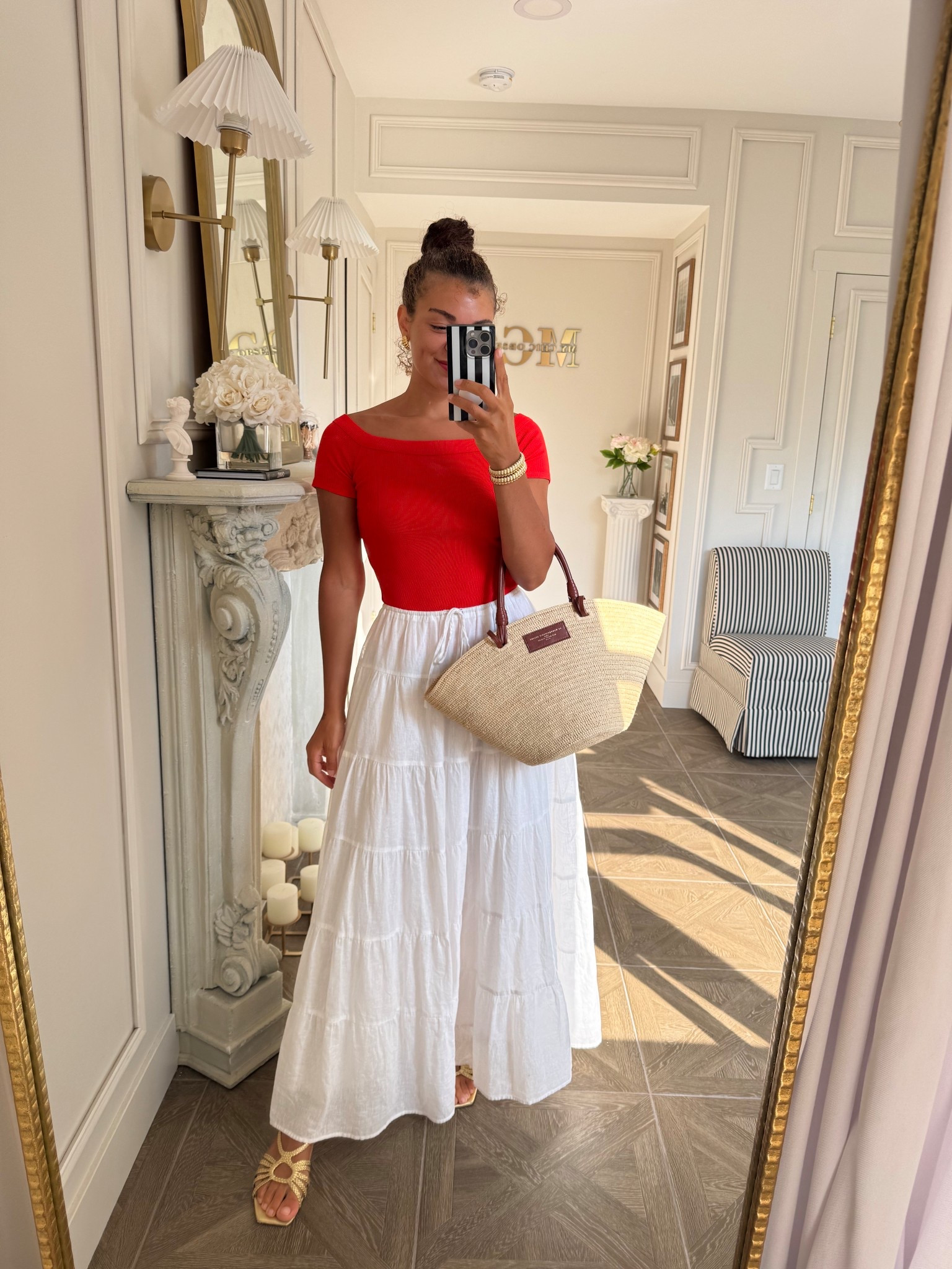 Summer outfit idea: red orange off the shoulder top paired with a maxi white skirt, straw bag, and gold sandals #LTKSummerEdit 

#LTKStyleTip #LTKSeasonal