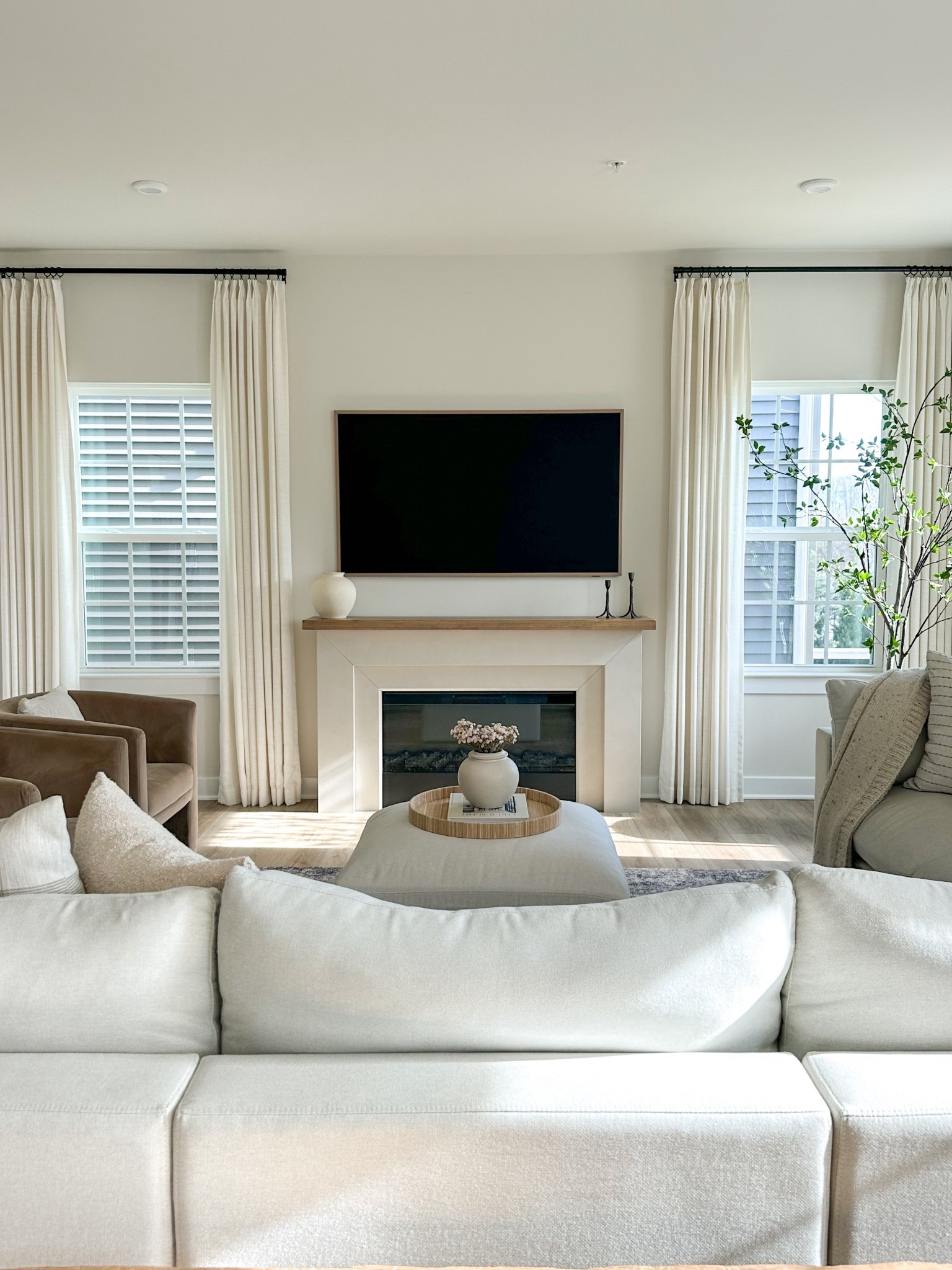 Cozy, neutral, and timeless living room views. 
#livingroom #electricfireplace #homedecor 

#LTKHome