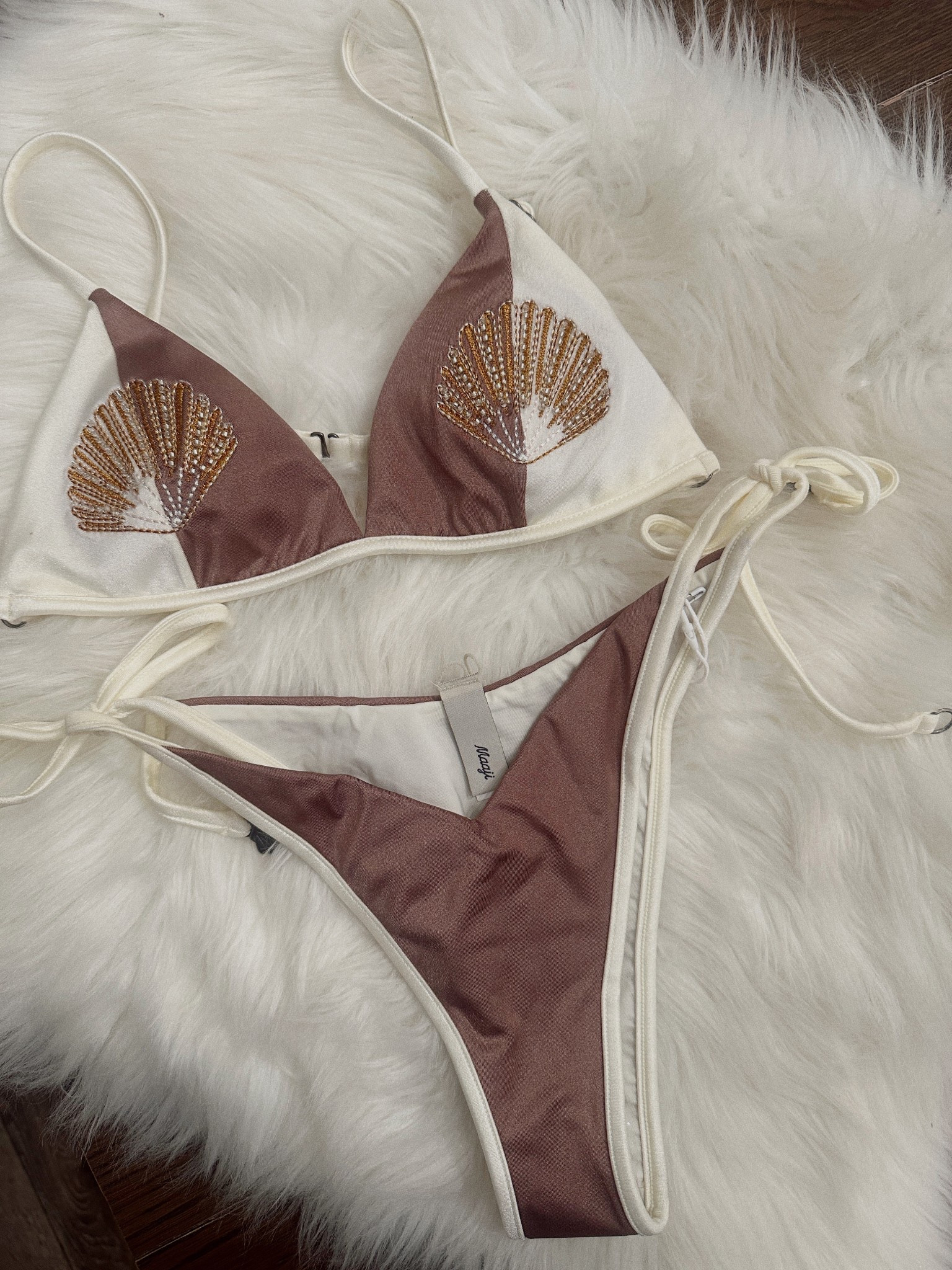 New in!! I order this bikini top and bottom for a tropical getaway we have coming up!! Maaji is a Colombian brand I love! The designs are always so good and different and the quality is amazing.  The color and details turned out so good!! It’s beautiful and looks really good on!! The bottom is very tiny. I actually went up a size and order size M. 
Top is size small. 


#LTKSeasonal #LTKFindsUnder100