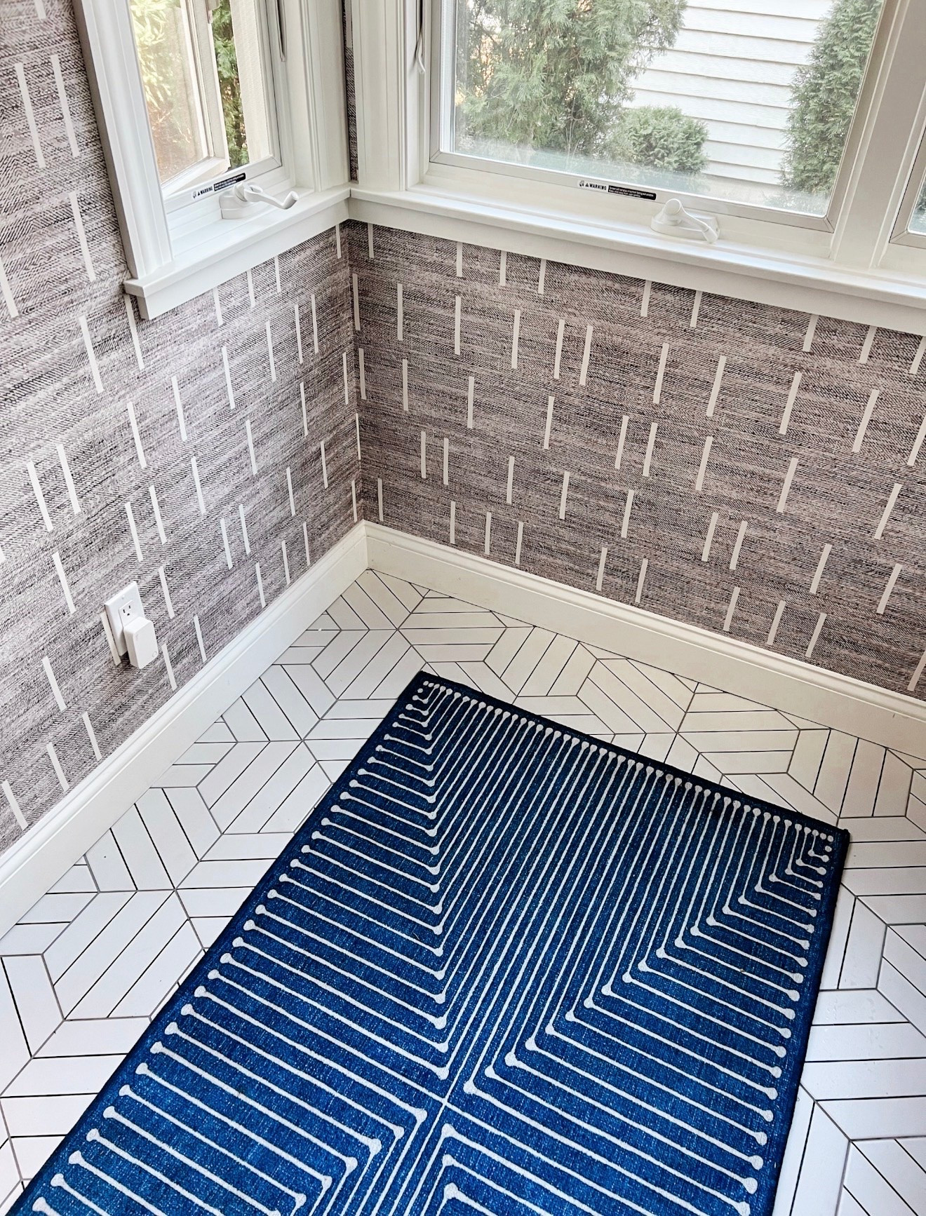 This space is proof that geometric patterns can play well together. The wallpaper, tile and blue rug each bring a different direction and scale, which keeps the mix interesting instead of repetitive.

pattern mixing, geometric wallpaper, patterned tile, blue rug, small space decor, layered patterns, entryway decor, interior styling, wallpaper inspiration, Girl on the Hudson

#LTKHome