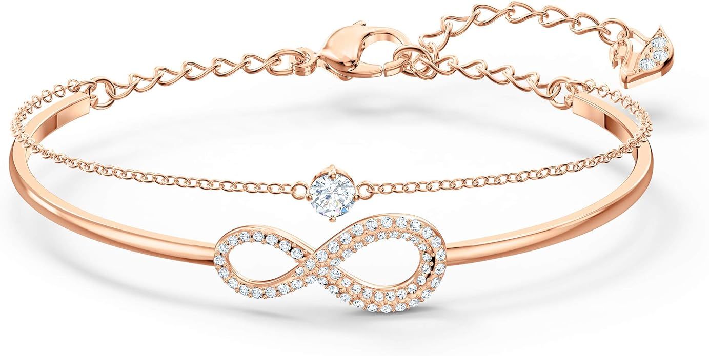 Swarovski Women's Infinity Knot Rose-Gold Tone Finish Bangle Bracelet, Necklace & Earrings Crysta... | Amazon (US)