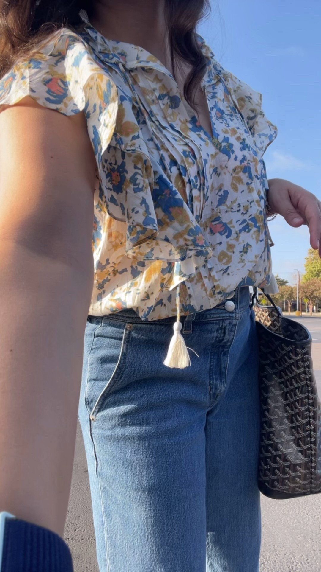 Mom on the go style 
Flowy sleeve top, on sale under $70 
Petite cut denim 
Chloe Lauren scallop flats 
Ray ban wayfarers 
Goyard Artois 
Easy outfit ideas for moms 

#LTKmomlife #LTKSaleAlert