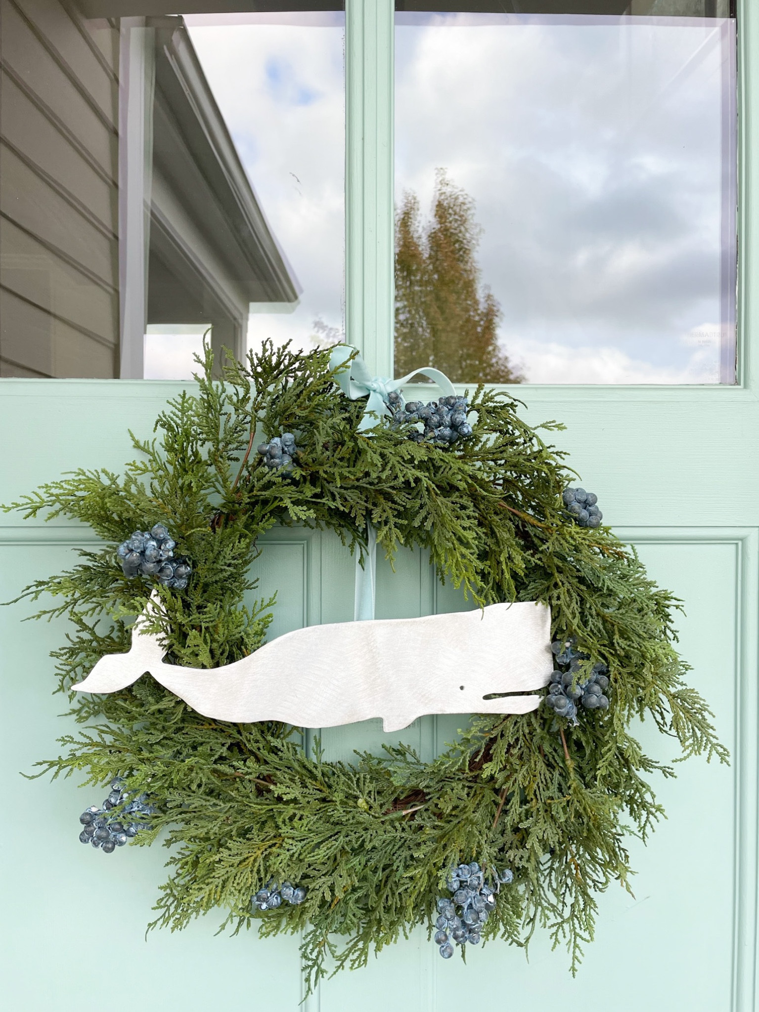 Metal whale on wreath - coastal cottage Christmas decor 

#LTKhome #LTKSeasonal #LTKHoliday