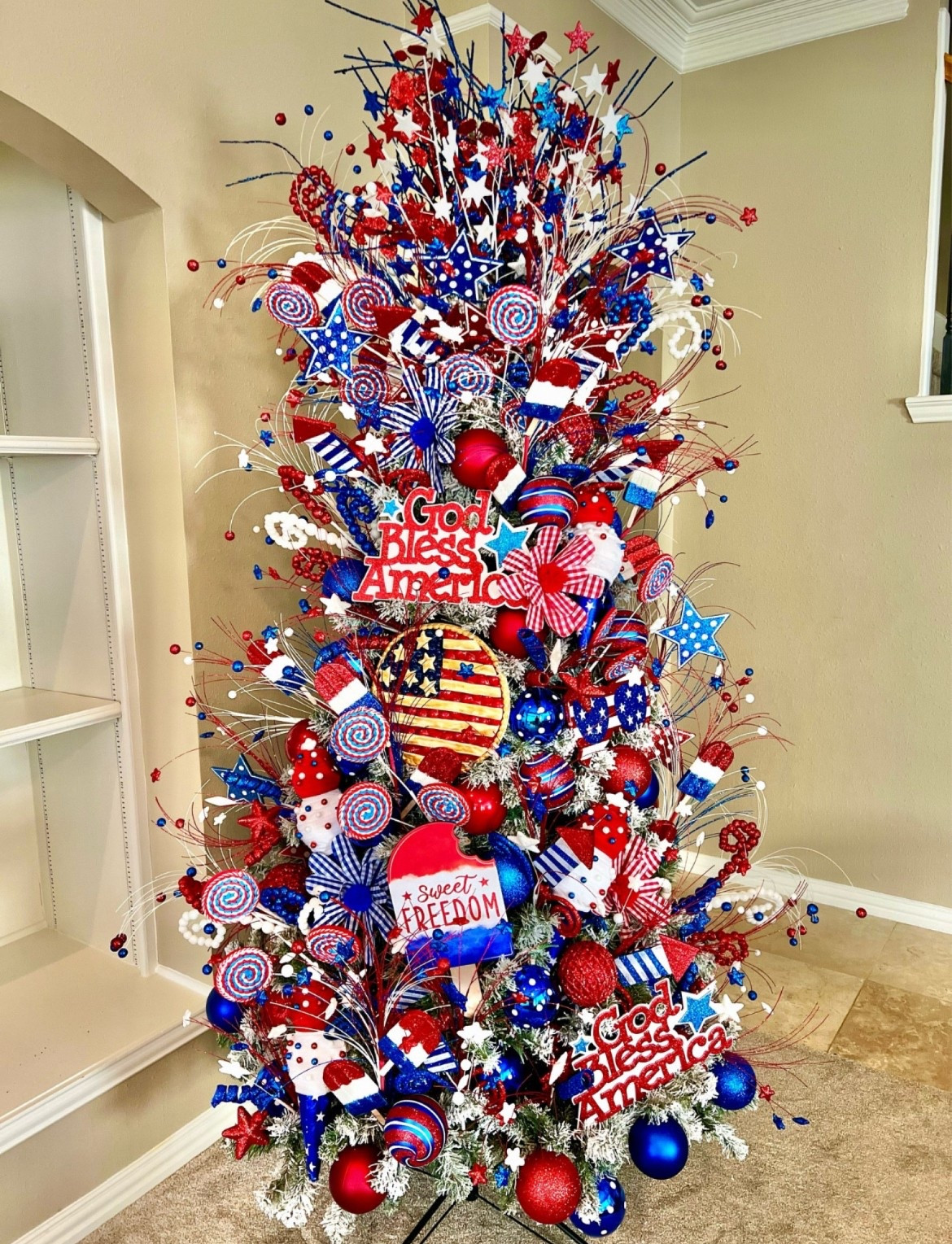 Shop my Patriotic Tree! Perfect for Memorial Day & the 4th of July! ❤️🤍💙

#LTKSeasonal #LTKHome #LTKParties