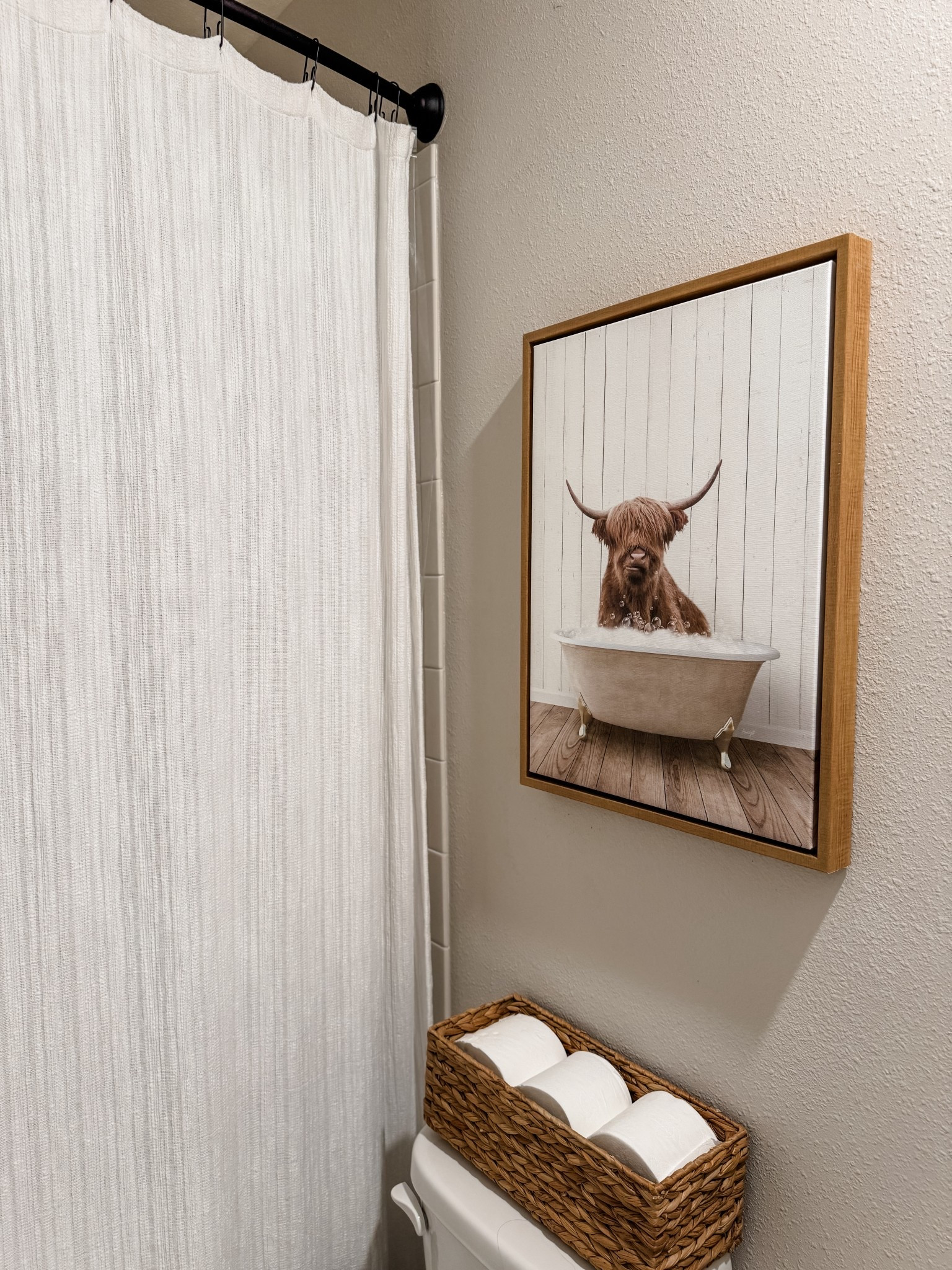 Farmhouse bathroom refresh! 🖤 Add charm with this Highland Cow framed canvas wall art, keep essentials tidy with the Hyacinth toilet organizer basket, and upgrade your shower with a sleek curved curtain rod. Small changes, big style impact! #FarmhouseBathroom #HighlandCowDecor #BathroomOrganization #CurvedShowerRod #HomeDecorFind

#LTKHome