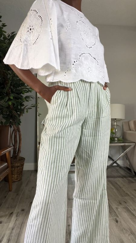 Spring outfit!  White embroidered top with angel sleeves, green and white striped linen pant and white strappy sandals  

#LTKFindsUnder100 #LTKShoeCrush #LTKVideo