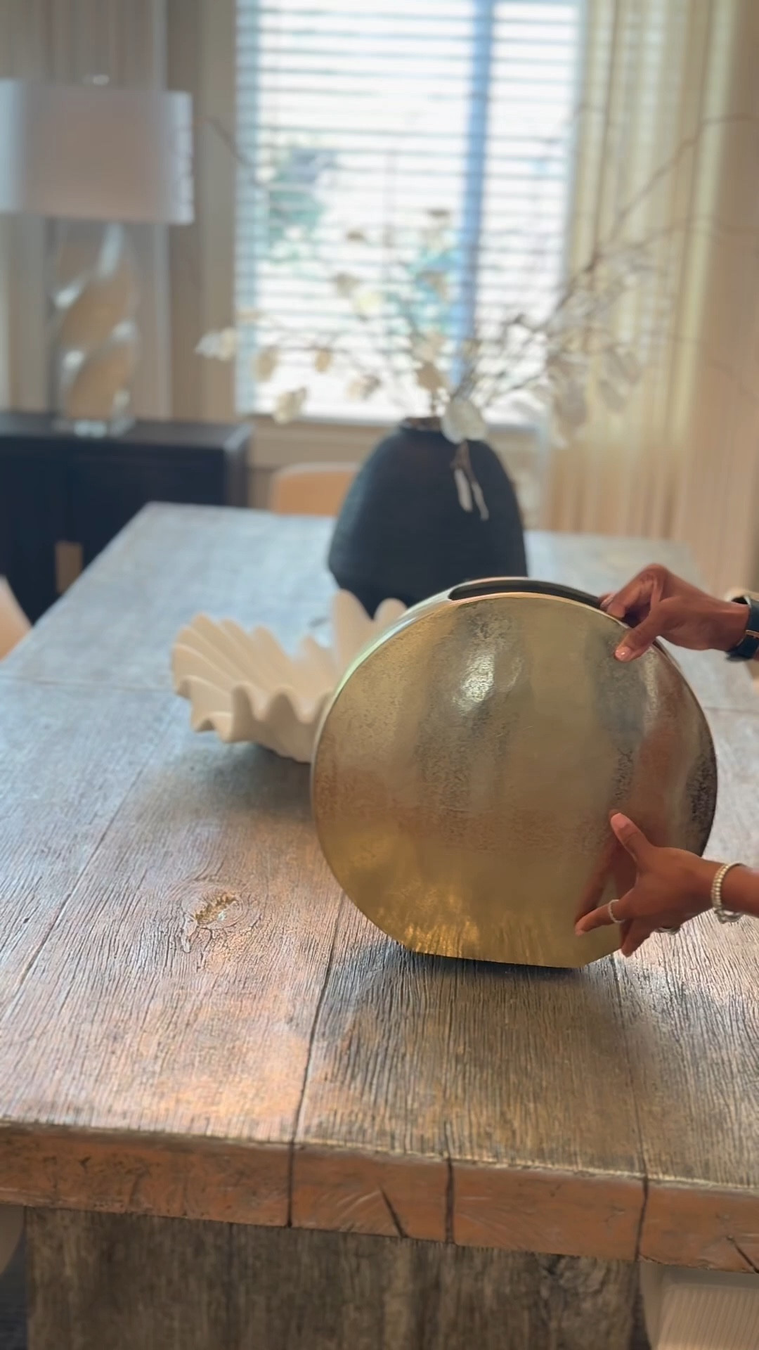 Statement gold vases are one of my favorite ways to elevate a console or entryway. Paired with soft blush stems and a mirror backdrop, it creates an instant focal point without overstyling the space.

Shop the vases and similar pieces here. 

#LTKOver40 #LTKHome #LTKSeasonal