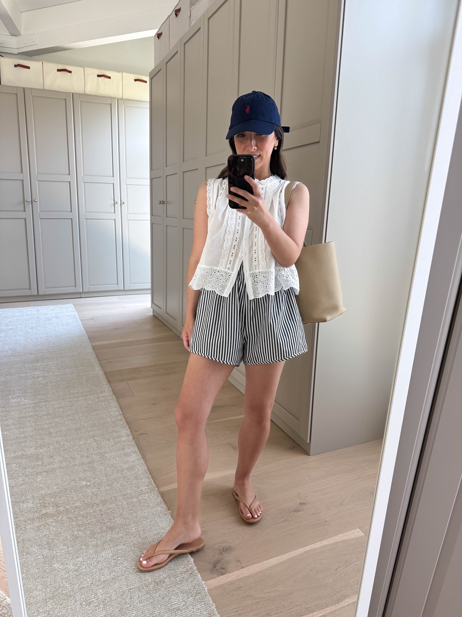 No-fail summer outfit formula: feminine white top + relaxed cotton shorts. 

Amazon tank small
Recreational Habits short medium
Beek sandals 5
The Row bag medium
Polo Ralph Lauren hat
Electric Picks earrings
Dorsey James necklace 15”

summer outfits, summer style, petite style

#LTKmomlife #LTKootd #LTKPetite