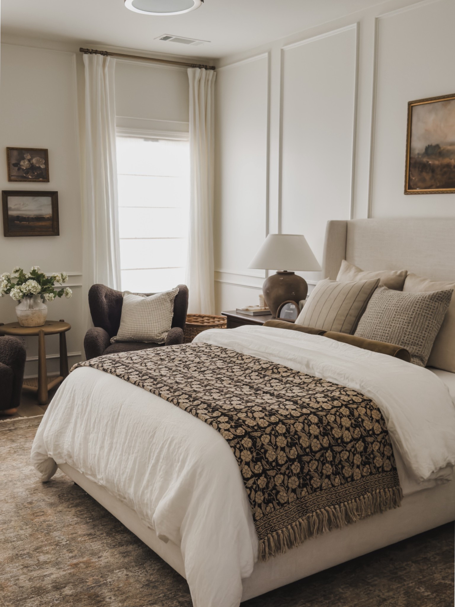Cozy and layered guest bedroom — timeless vibes with touches of spring and intentional pieces. Love added small seasonal touches that still transition well through each season.

Home finds, neutral home inspo, spring refresh, guest bedroom refresh, furniture favorites, neutral wood tones, layered bedding, accent chair, creamy whites, linen details, upholstered bed, neutral area rug, vintage style area rug, timeless spring bedroom, cozy throw pillow, Etsy, Wayfair, Amber Lewis, Loloi, Pottery Barn style, Four Hands, shop the look!

#LTKHome #LTKSeasonal