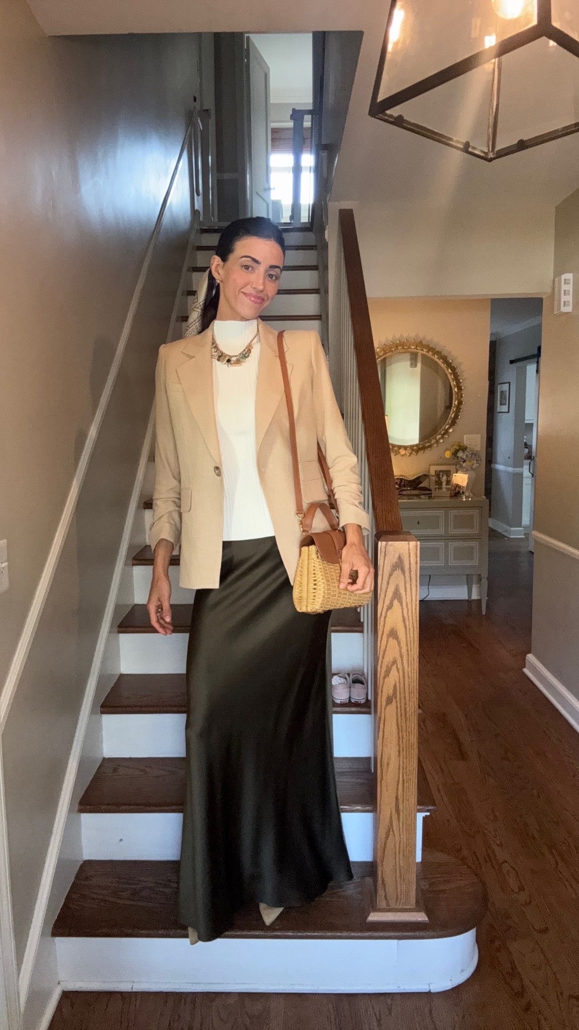 The Nellie Tank Top Shell offers a sleek, slim fit with a mock turtleneck, making it an ideal layering piece. Paired with the Battista Dickey Jacket, featuring a classic single-breasted silhouette and pre-ruched sleeves, and the coordinating skirt, this ensemble delivers a modern take on the power suit.

#LTKPetite #LTKStyleTip #LTKWorkwear