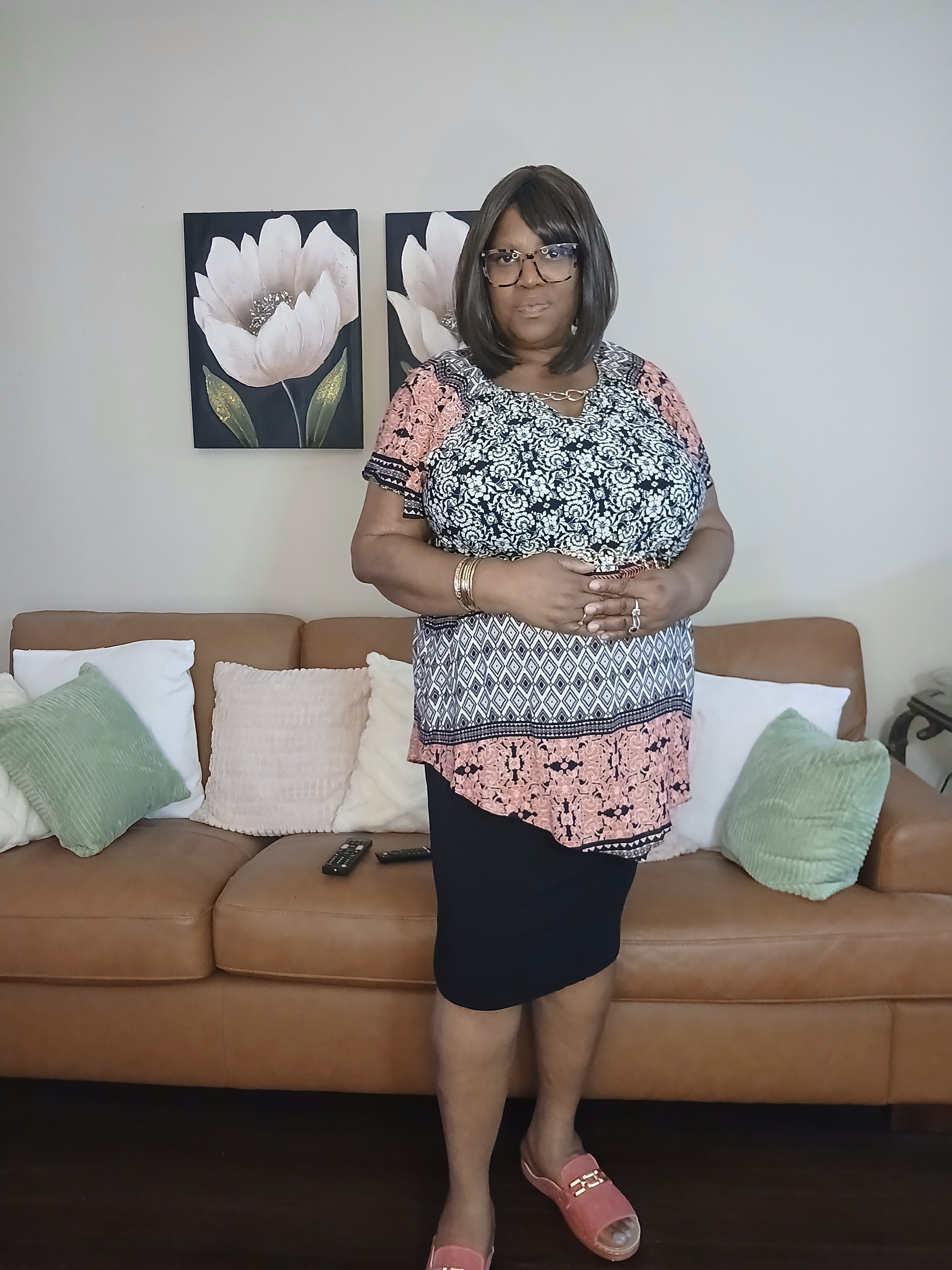 Plus size multi-colored top, black skirt,  dark mauve colored sandals,  with gold bangle bracelets. #ltk #ad

#LTKootd #LTKPlusSize #LTKOver40