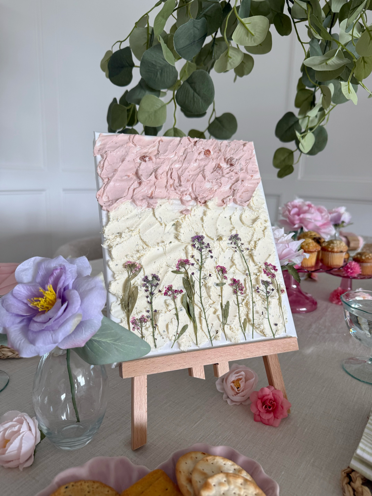 How fun is this Cheese Art Canvas! So pretty and so simple to create! ✨🌸

Here is everything I used: 

- 8x10 canvas (cover in wax paper) 
- Small tabletop display easel 
- Dried pressed flowers 
- Boursin Garlic & Fine Herbs Spreadable Gourmet Cheese
- Strawberry cream cheese 



#cheeseboard #cheesecanvas #brunchideas #hostingideas #tablescape #tablesetting #gardenparty #momsday #mothersday #entertaining #cheeseartcanvas 

#LTKfoodie #LTKHome #LTKMothersDay
