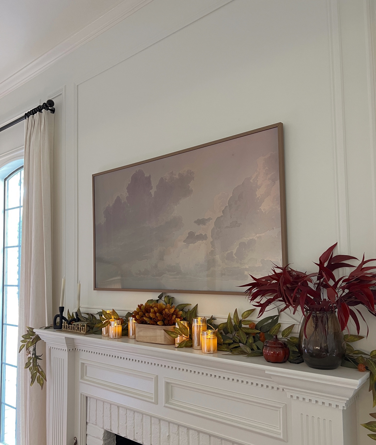 Our frame tv, the wood frame (modern teak) and the art are all linked! We love how seamlessly it sits on the wall, this is the 65” and we have the 55” in our bedroom. 

#LTKSeasonal #LTKsalealert #LTKhome