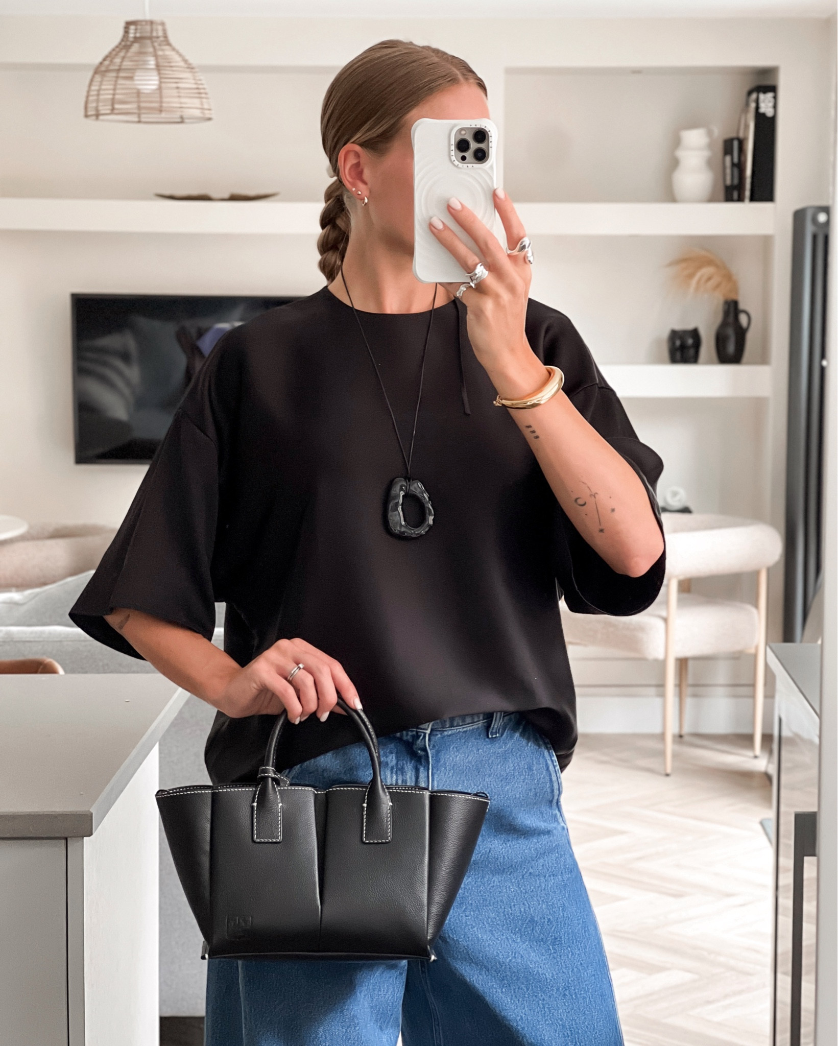 Summer outfit: minimal. casual. chic  🖤

Arket barrel leg jeans black (size down)
Lilysilk black silk t-shirt
Le Tanneur black leather bag (Parisian French brand)
COS Black pendant 
SEZANE Lou gold bracelet 
Rings - coming soon 🫶🏼

#LTKsummer #LTKuk #LTKluxury