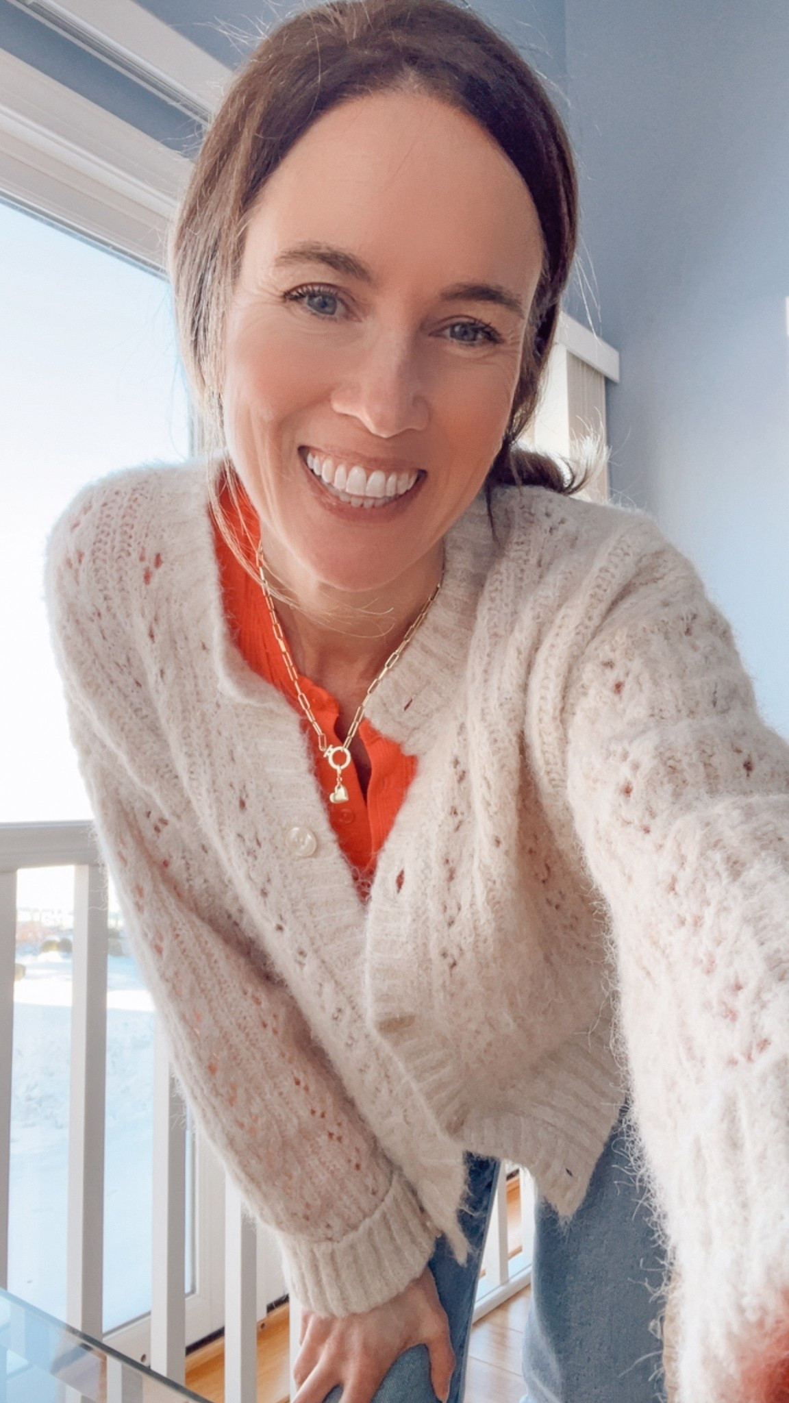 Women's Winter Outfit Idea - with a pop of color for spring - Love this $9 henley I picked up at American Eagle in this bright coral pink color.  Also, comes in other neutral colors - great for spring and summer.  #ae #henley #womenfashion #OOTD #MyLook #GRWM #over40style #springstyle #winterstyle #winterfashion 

#LTKootd #LTKOver40 #LTKSaleAlert