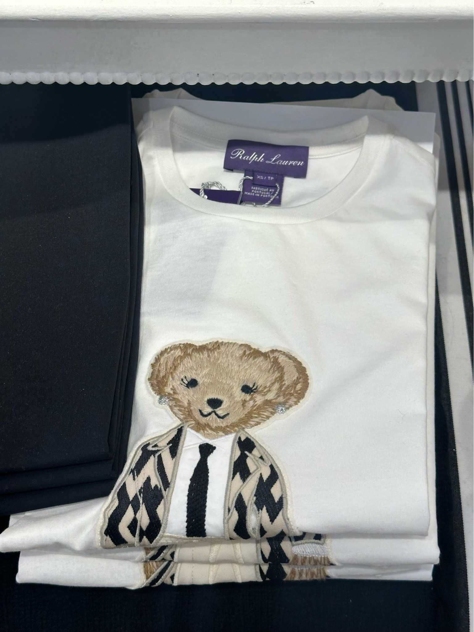 The purple label Ralph Lauren t shirt is sold out but there’s a less expensive one that is just as cute