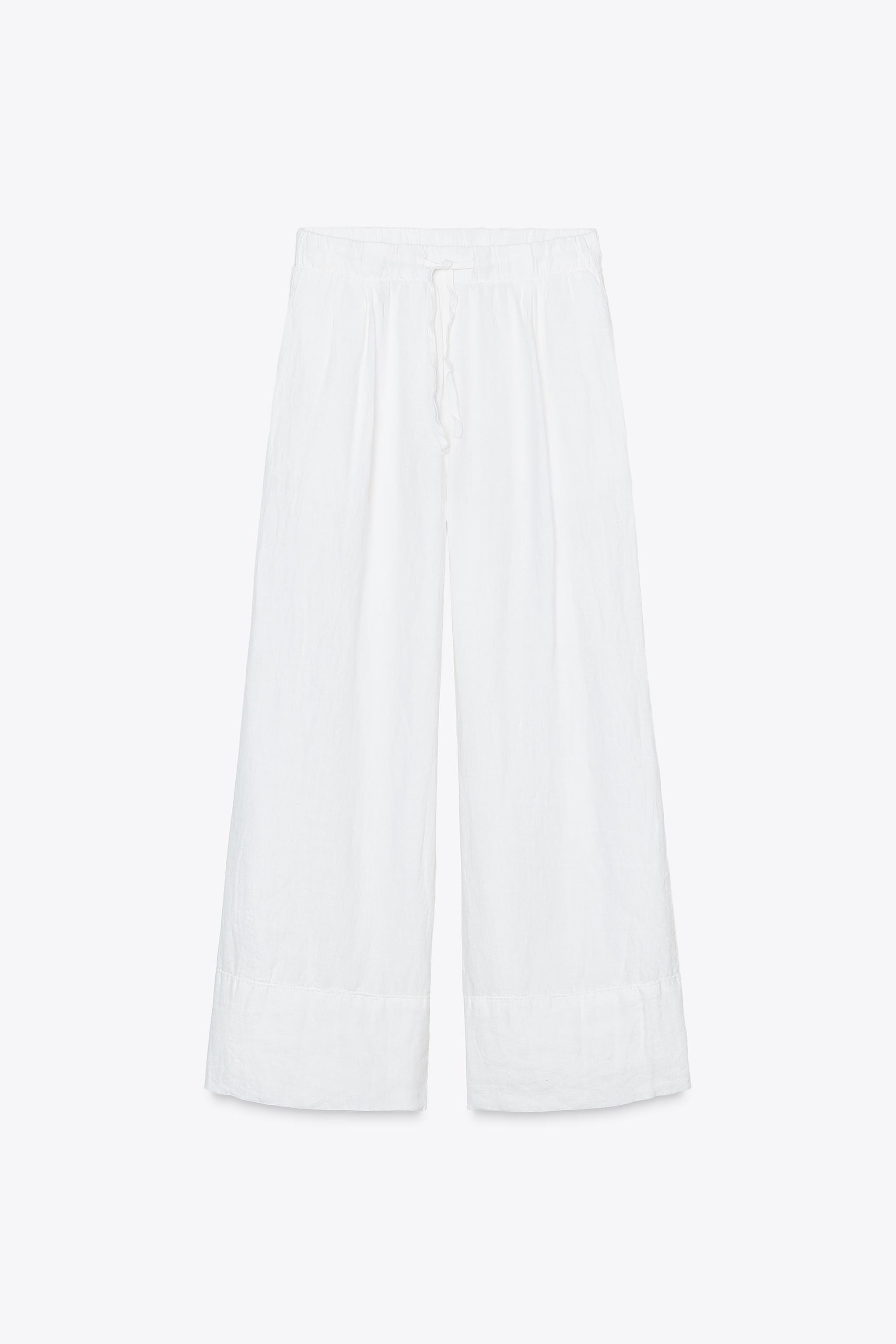 ZARA WOMAN COLLECTIONPants made of 100% linen fabric. Mid rise and elastic waistband with adjusta... | Zara US