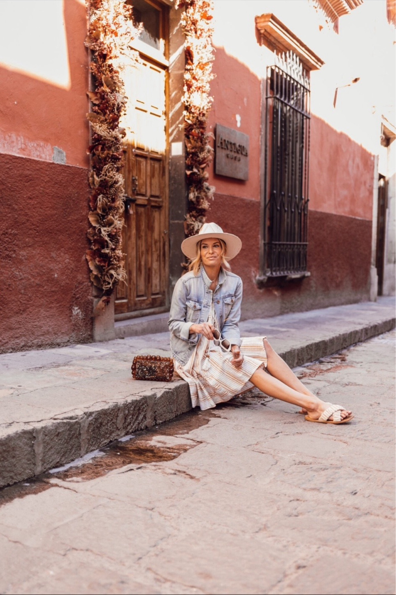 Vacation outfit 🤍 mini dress / denim jacket / cult Gia clutch / straw hat / gold necklace / neutral slides 

#LTKSeasonal #LTKTravel #LTKStyleTip