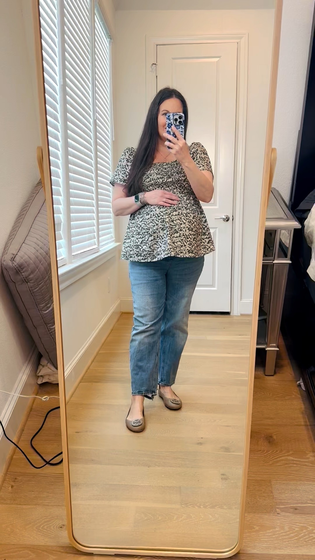 This winter outfit is one of my favorite everyday maternity outfit options. If you love an elevated yet comfortable dressy casual style, this look is such a win for pregnancy. I styled a maternity smocked short sleeve top with straight leg blue jeans—these are truly the best maternity jeans for a flattering fit and all-day comfort.

I finished the look with gray ballet flats to keep it polished but easy to wear. This outfit is a perfect example of effortless pregnancy style—comfortable, bump-friendly, and still feeling put together.

Everything is linked below so you can recreate this look 

#LTKBump #LTKFindsUnder100 #LTKSeasonal