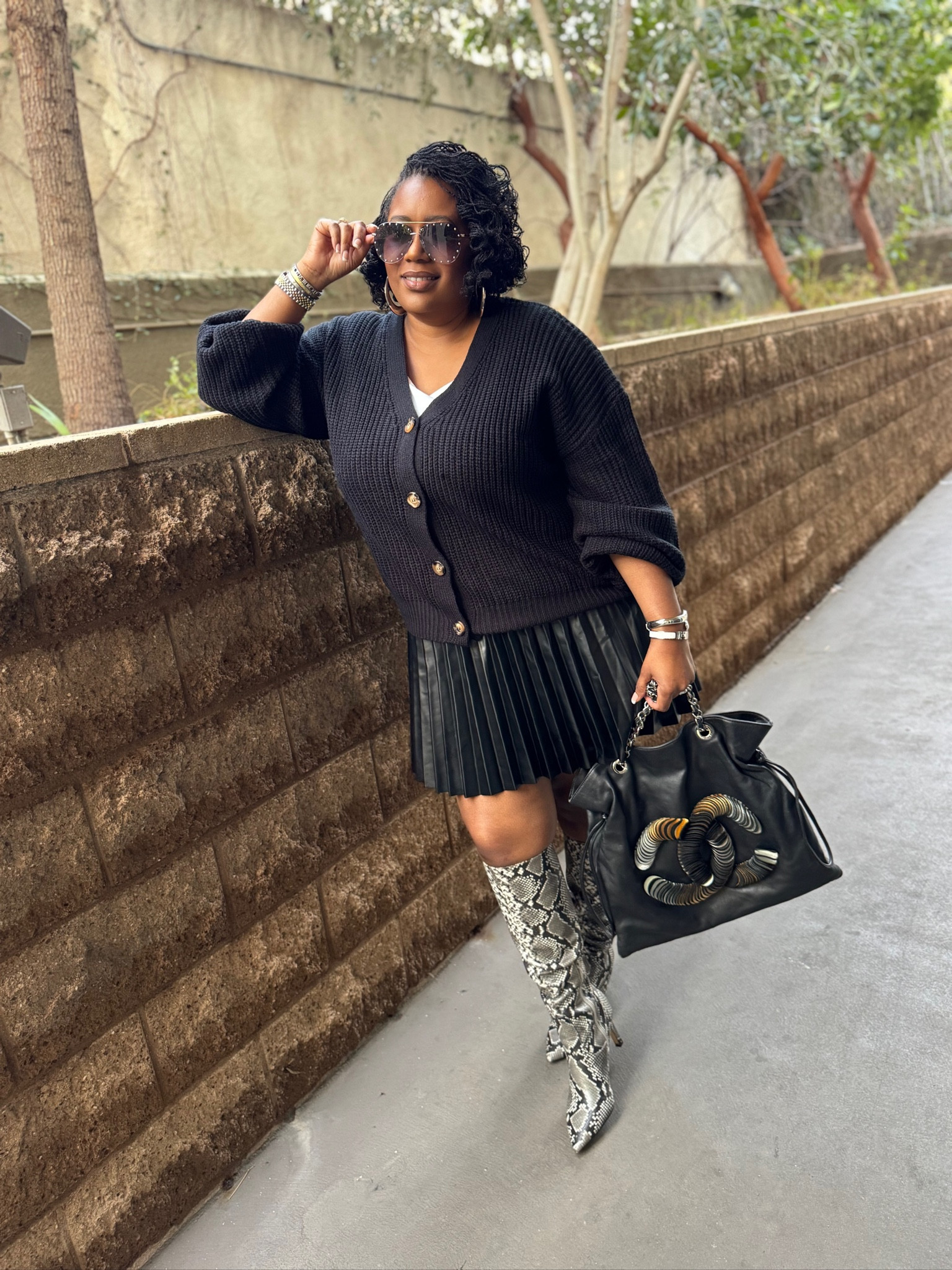Sunday’s Best 🖤

This skirt and sweater both run big so order your regular size or size down. The quality on both is amazing. The heels are Nine West as usual and they are super comfortable.  My bag is vintage Chanel  Happy shopping!

#LTKmidsize #LTKworkwear #LTKover40