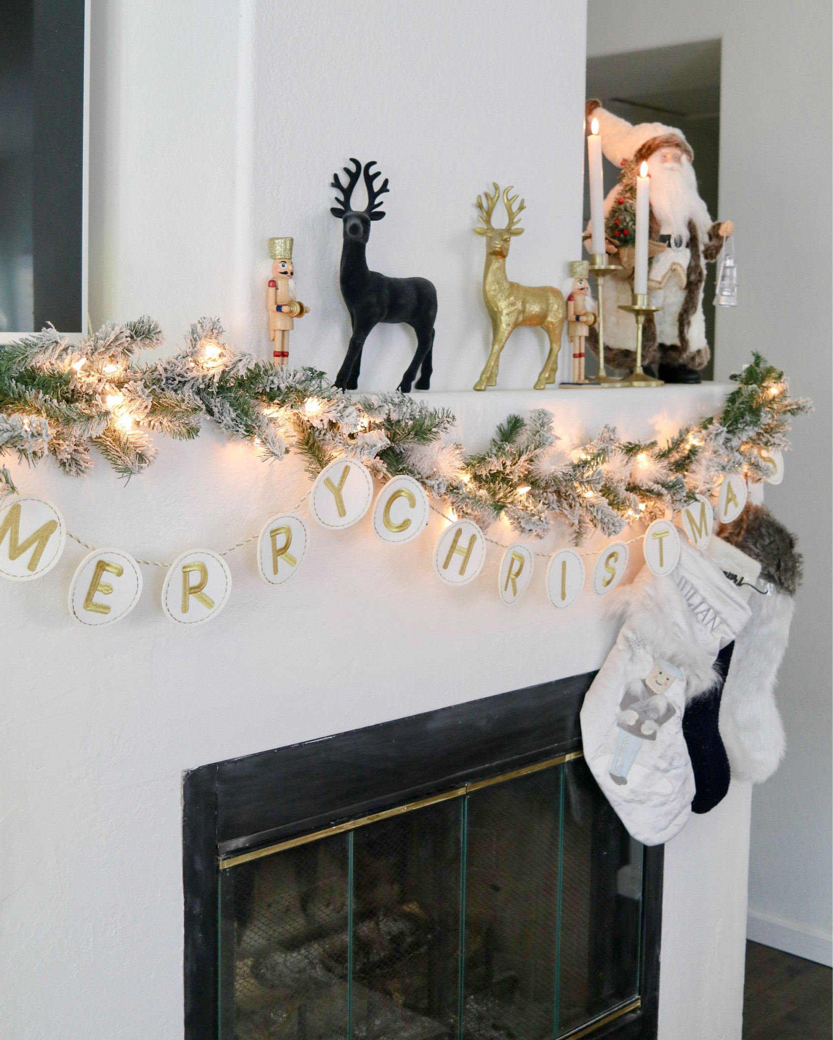 mantle decor, Christmas decor on mantle, Merry Christmas garland, black reindeer figurine, gold reindeer figurine, Santa figurine

#LTKhome #LTKunder100 #LTKHoliday