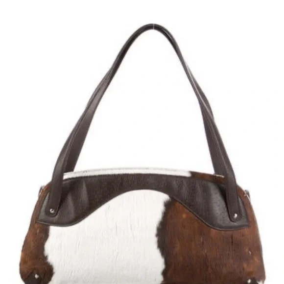 salvatore ferragamo bag with a real cow skin in a grest condition | Poshmark